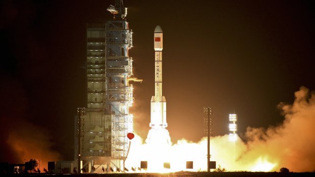 China's Tiangong-1 space station blasts off on a Long March-2FT1 carrier rocket from the launch pad at the Jiuquan Satellite Launch Centre in north-west China's Gansu Province on September 29, 2011.
