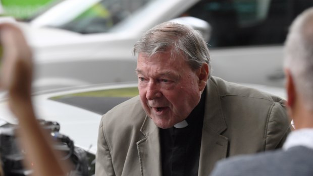 Cardinal George Pell arrives at the Magistrates Court on Thursday.