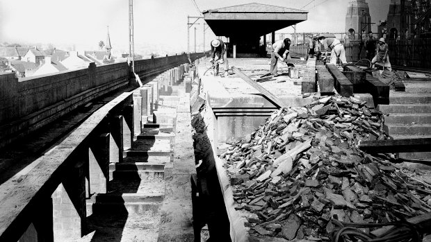 The Milsons Point tram station is demolished by workmen on 10 July 1958. 