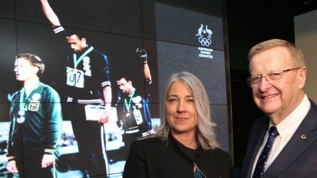 John Coates and Janita Norman at a ceremony for Olympian Peter Norman, who received a posthumous AOC honour.