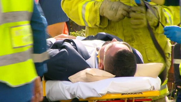 Salim Mehajer being pulled from the wreck of his car in the allegedly staged crash last year. 