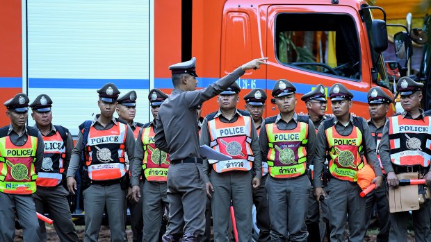 Thai police at the base camp where the rescue operations are being planned.