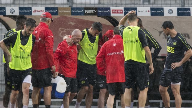 Relief: Granit Xhaka limps off at training.