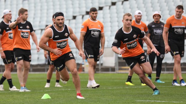 Home: Robbie Farah, left, during his first day back at Tigers training. 