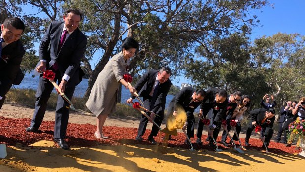 Premier Mark McGowan turning the sod on Golden Group's $3.8 billion Belmont Park development, with Indonesian property mogul Mimi Wong.