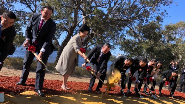 Premier Mark McGowan turning the sod on Golden Group's $3.8 billion Belmont Park development, with Indonesian property mogul Mimi Wong.