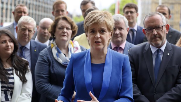 Nicola Sturgeon, First Minister of Scotland and the leader of the Scottish National Party, centre.