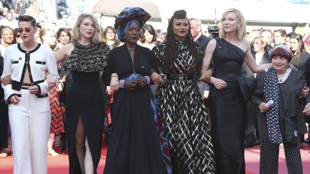 Jury members Kristen Stewart, from left, Lea Seydoux, Khadja Nin, Ava Duvernay, Cate Blanchett and director Agnes Varda walk the red carpet as part of 82 film industry professionals to represent, what they describe as pervasive gender inequality in the film industry, at the 71st international film festival, Cannes.