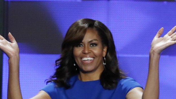 First Lady Michelle Obama walks on stage during the first day of the Democratic National Convention in Philadelphia.