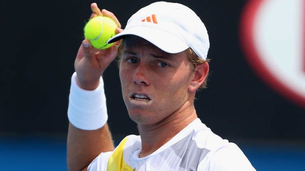 James Duckworth of Australia gave everything in his second round match against Blaz Kavcic.