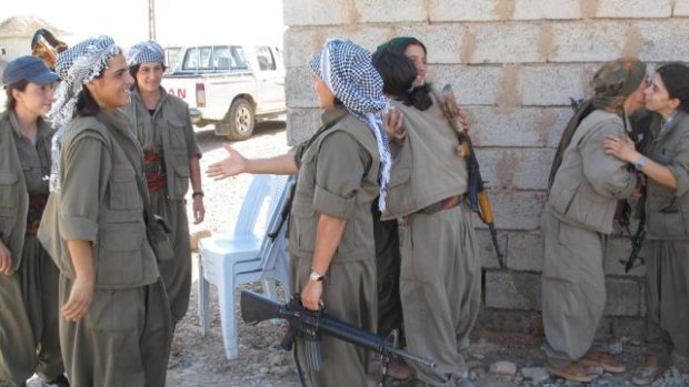 PKK fighters at the Daquq PKK base after a night gathering intelligence on the frontline.