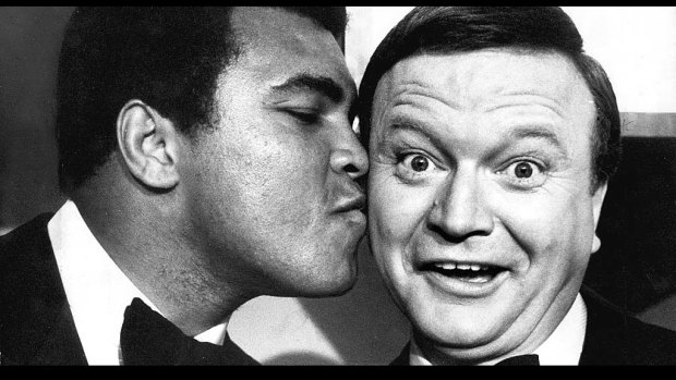 Muhammad Ali forgives Bert Newton for his "I like the boy" gaff with an after show kiss on the cheek at the 1979 Logies.
