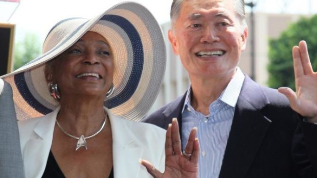 Nichelle Nichols and George Takei attend Walter Koenig being honored with a star on the Hollywood Walk of Fame in 2012.