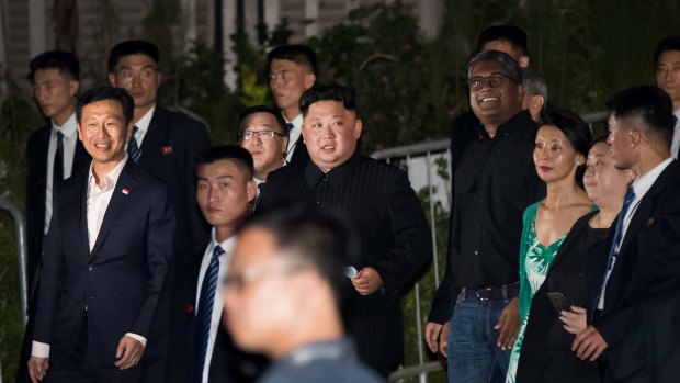 Kim Jong-un tours the Esplanade in Singapore on Monday night.