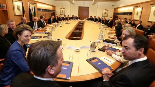 Prime Minister Tony Abbott meets with his ministry in the cabinet room at Parliament House in Canberra on Wednesday.
