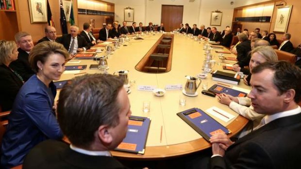 Prime Minister Tony Abbott meets with his ministry in the cabinet room at Parliament House in Canberra on Wednesday.