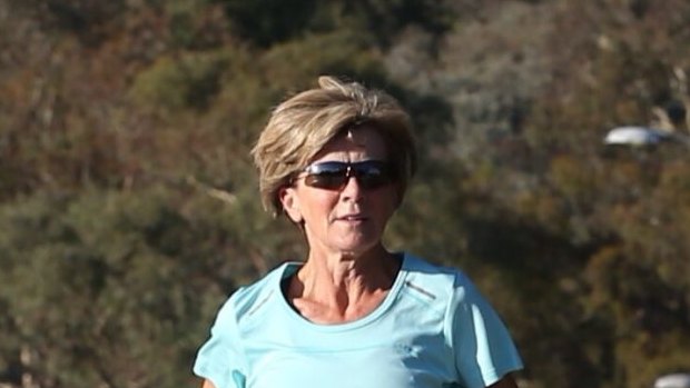 Foreign Affairs Minister Julie Bishop runs to Parliament House on Wednesday.