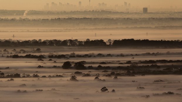Fog and smog across the Sydney Basin on the coldest morning of the year so far.