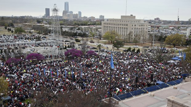 A crowd fills the south lawn of the state Capitol in Oklahoma City.