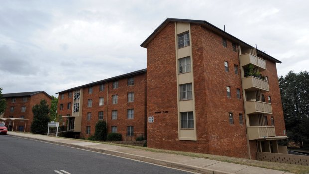 The ACT budget pushes ahead with the government's sale of dilapidated public housing blocks in Griffith, Narrabundah, Lyneham, and Lyons.