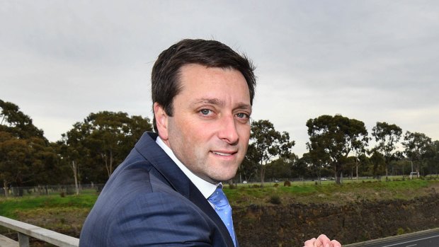 Victorian Opposition leader Matthew Guy at the Eastern freeway overpass on Friday. 