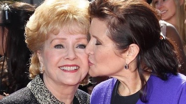 Debbie Reynolds' son released a statement to Variety saying, "she's with Carrie."