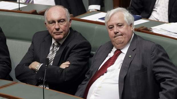 Clive Palmer sits with Deputy Prime Minister Warren Truss during a division related to the mining tax repeal bills. Photo: Andrew Meares