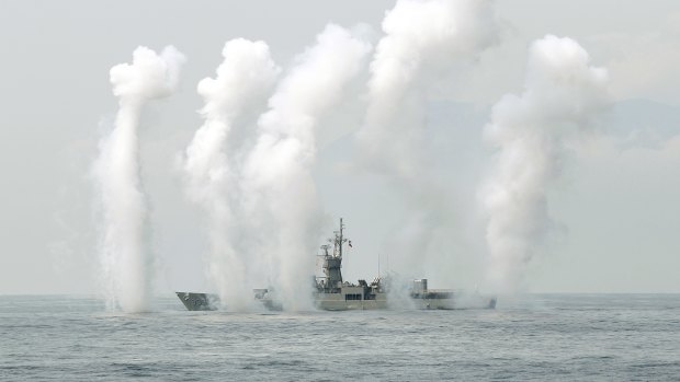 A Taiwan Navy's Knox-class frigate fires chaff during a navy exercise in the bound of Suao naval station in Yilan County, northeast of Taiwan.