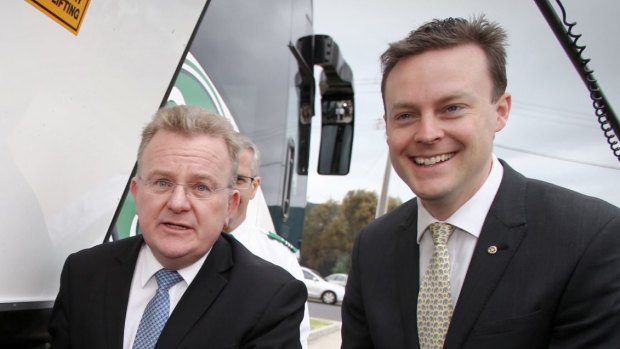 Chris Crewther (right) campaigning as a candidate  with former Dunkley MP Bruce Billson.