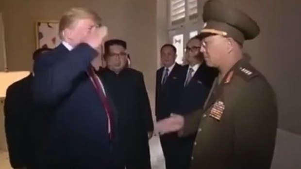 Trump saluting to North Korean general.