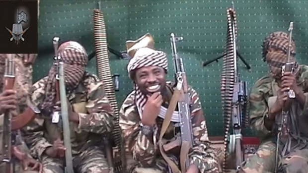 The smiling assasin: A screen grab from a video dated September 25 that shows a man claiming to be the leader of Nigerian Islamist extremist group Boko Haram.