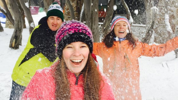 Mt Buller residents Ben Annear, Kate Monahan and Katie Bowker enjoy the fresh snow.