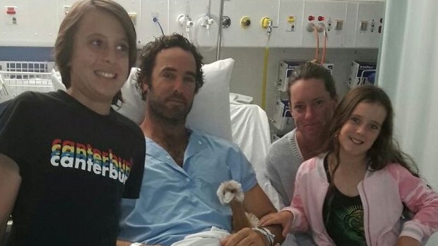 Alejandro Travaglini with his partner Tanya Hawthorne and two children at Royal Perth Hospital.