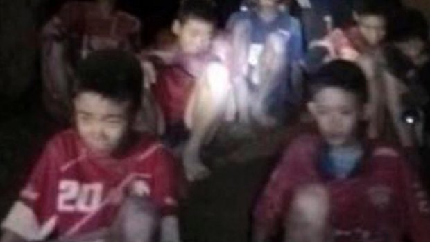 The boys and their soccer coach as they were found in a partially flooded cave, in Mae Sai, Chiang Rai, Thailand. 
