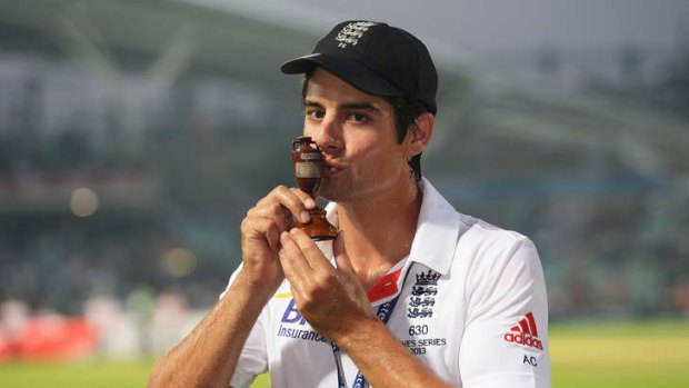 England captain Alastair Cook kisses the cherished Ashes urn after leading his team to a three-nil series victory against Australia, which ended with a draw at The Oval.