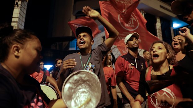 Supporters of Brazil's former President  gather outside his residence in Sao Bernardo do Campo,, Brazil, as the court voted on his request for habeas corpus.