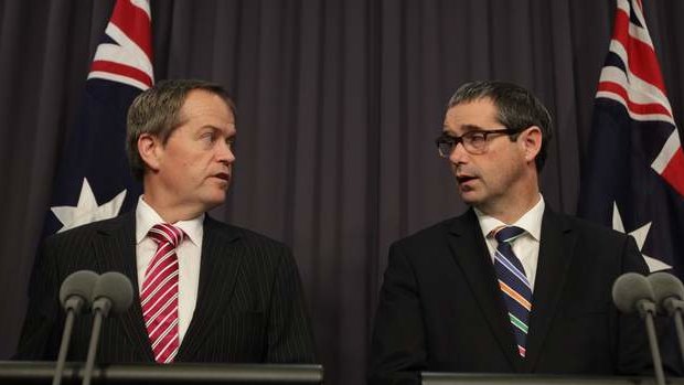 Workplace Relations Minister Bill Shorten and Communications Minister Senator Stephen Conroy at a press conference on Monday.