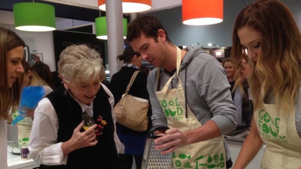 Maggie Beer lends her support to Eamon Sullivan and Rayne Embley at the Good Food and Wine Show macaron cook off.