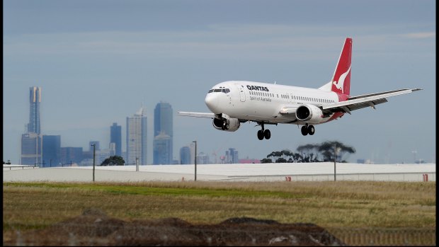 Passengers on Qantas flight QF 36 from Singapore have been told to be alert for symptoms.