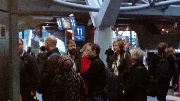 Passengers queue for the lift at Southern Cross Station yesterday, expect more of the same today.