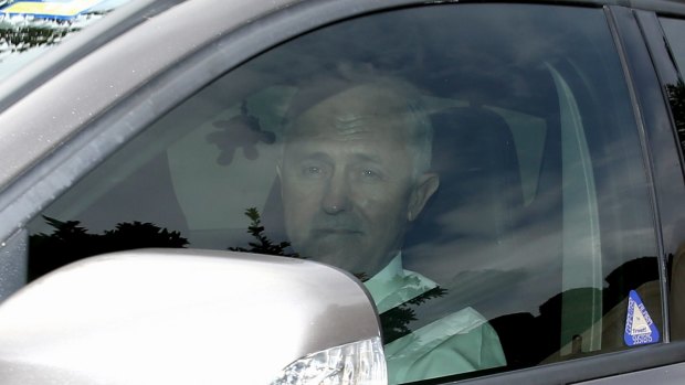 Communications Minister Malcolm Turnbull departs after a cabinet meeting at Parliament House on Wednesday.