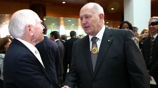 Former Prime Minister John Howard greets Sir Peter Cosgrove on Friday. Photo: Alex Ellinghausen