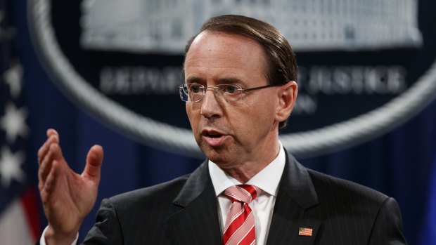 Deputy Attorney-General Rod Rosenstein speaks during a news conference to announce the charges at the Department of Justice in Washington.