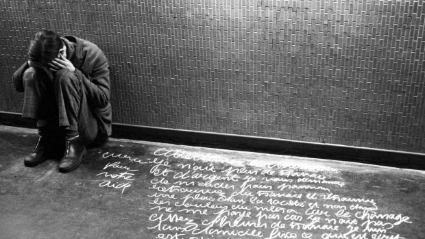 The Rollei's shutter is almost silent. Yet the beggar heard it. He leapt to his feet, yelling. I ran off, feeling terrible. "Beggar with screed written with chalk"; Metro tunnel, February 1981.