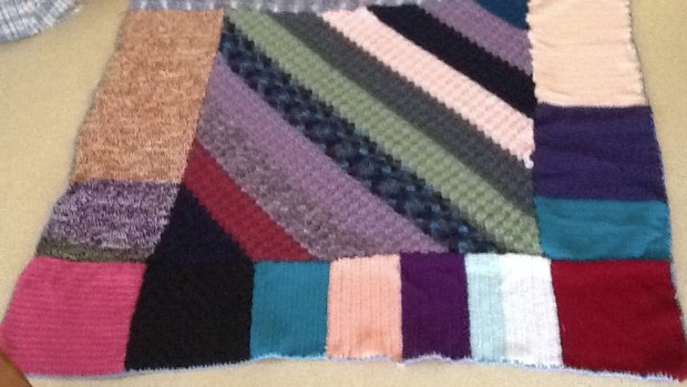 A blanket knitted by one of K4BN's knitting and nattering groups.