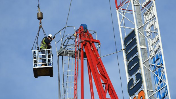 Construction workers began dismantling the crane on Wednesday.