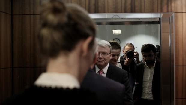 Prime Minister Kevin Rudd enters a lift before a press conference in Melbourne on Thursday.