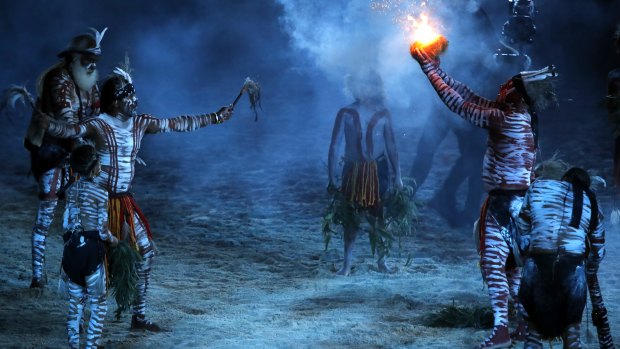 Aboriginal Australians perform a smoking ceremony during the opening ceremony for the Commonwealth Games. 