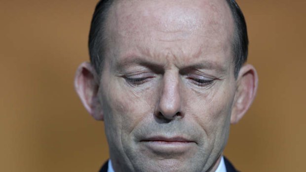 Prime Minister Tony Abbott addresses the media on Friday. Photo: Alex Ellinghausen