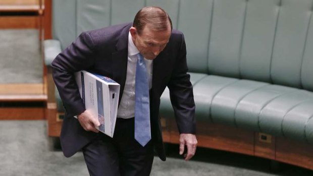 Prime Minister Tony Abbott arrives for question time. Photo: Alex Ellinghausen